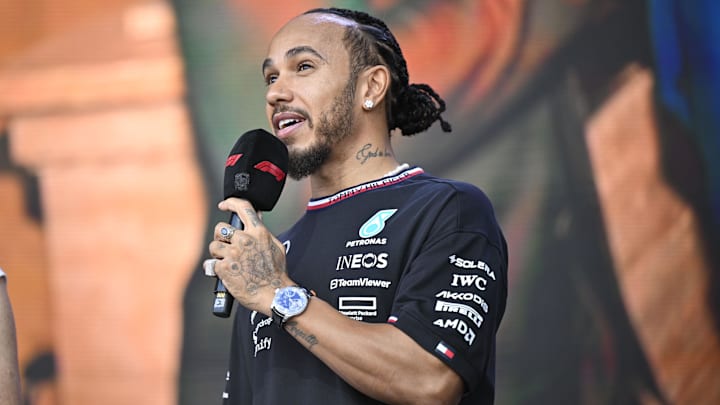 Oct 19, 2024; Austin, Texas, USA; Mercedes AMG Petronas F1 Team driver Lewis Hamilton (44) of Team Great Britain speaks to the crowd during a fan forum before the Sprint Race in the 2024 Formula One US Grand Prix at Circuit of the Americas. Mandatory Credit: Jerome Miron-Imagn Images