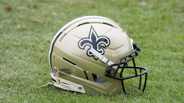 Aug 14, 2025; Carson, CA, USA; A New Orleans Saints helmet on the field during a joint practice against the Los Angeles Rams at the Dignity Health Sports Park. Mandatory Credit: Kirby Lee-Imagn Images
