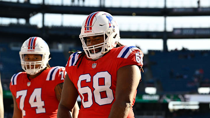 Dec 1, 2024; Foxborough, Massachusetts, USA; New England Patriots center Lecitus Smith (68) warms up before a game against the Indianapolis Colts at Gillette Stadium. Mandatory Credit: Eric Canha-Imagn Images