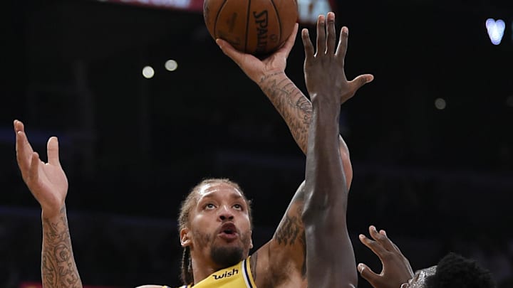 Jan 15, 2019; Los Angeles, CA, USA; Los Angeles Lakers forward Michael Beasley (11) attempts a shot while Chicago Bulls forward Bobby Portis (5) defends during the second quarter at Staples Center. Mandatory Credit: Kelvin Kuo-Imagn Images Jan 15, 2019; Los Angeles, CA, USA; Los Angeles Lakers forward Michael Beasley (11) attempts a shot while Chicago Bulls forward Bobby Portis (5) defends during the second quarter at Staples Center. Mandatory Credit: Kelvin Kuo-Imagn Images