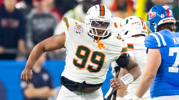 Jan 8, 2026; Glendale, AZ, USA; Miami Hurricanes defensive lineman Ahmad Moten Sr. (99) against the Mississippi Rebels during the 2026 Fiesta Bowl and semifinal game of the College Football Playoff at State Farm Stadium. Mandatory Credit: Mark J. Rebilas-Imagn Images Jan 8, 2026; Glendale, AZ, USA; Miami Hurricanes defensive lineman Ahmad Moten Sr. (99) against the Mississippi Rebels during the 2026 Fiesta Bowl and semifinal game of the College Football Playoff at State Farm Stadium. Mandatory Credit: Mark J. Rebilas-Imagn Images