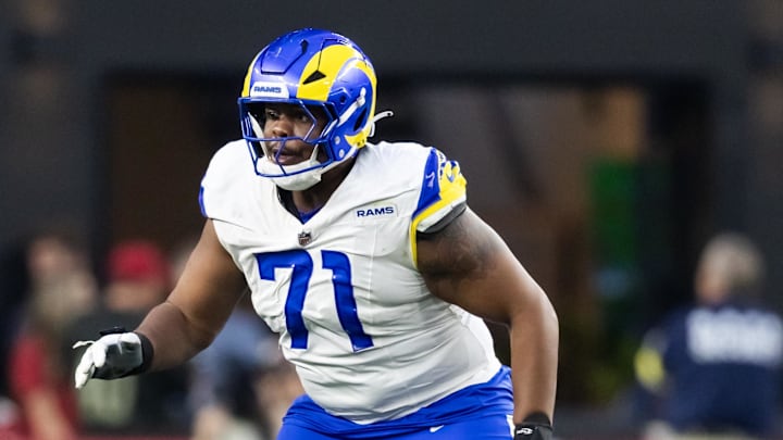 Dec 7, 2025; Glendale, Arizona, USA; Los Angeles Rams  offensive lineman Warren McClendon Jr. (71) against the Arizona Cardinals at State Farm Stadium. Mandatory Credit: Mark J. Rebilas-Imagn Images