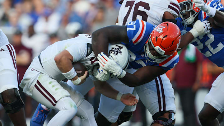 Florida defensive lineman Joseph Mbatchou (97) sacks Mississippi State quarterback Blake Shapen (2) during the first half of an NCAA football game at Steve Spurrier Field at Ben Hill Griffin Stadium in Gainesville, FL on Saturday, October 18, 2025. [Alan Youngblood/Gainesville Sun]