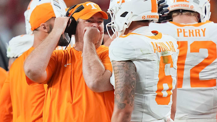 Tennessee coach Josh Heupel talks with Tennessee quarterback Joey Aguilar (6) during a college football game between Tennessee and Alabama at Bryant-Denny Stadium in Tuscaloosa, Ala., on Oct. 18, 2025. Tennessee coach Josh Heupel talks with Tennessee quarterback Joey Aguilar (6) during a college football game between Tennessee and Alabama at Bryant-Denny Stadium in Tuscaloosa, Ala., on Oct. 18, 2025.