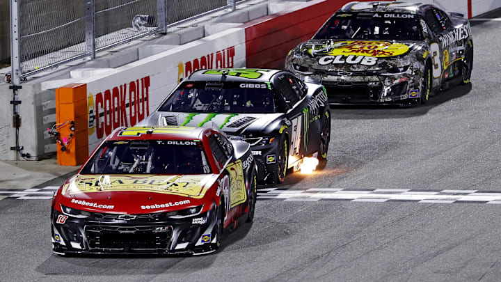 Feb 2, 2025; WInston-Salem, North Carolina, USA; NASCAR Cup Series driver Ty Dillon (10), NASCAR Cup Series driver Ty Gibbs (54) and NASCAR Cup Series driver Austin Dillion (3) during the last change qualifying race for the Clash at Bowman Gray at Bowman Gray Stadium. Mandatory Credit: Peter Casey-Imagn Images