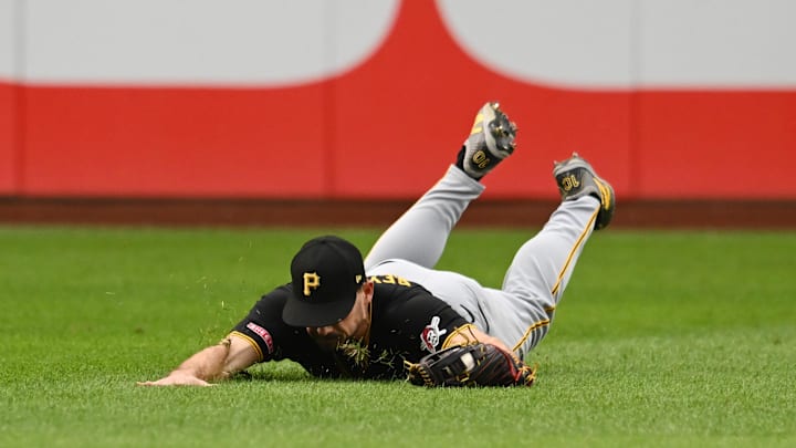 Aug 31, 2024; Cleveland, Ohio, USA; Pittsburgh Pirates left fielder Bryan Reynolds (10) catches a ball hit by Cleveland Guardians designated hitter Josh Naylor (not pictured) during the fourth inning at Progressive Field. Mandatory Credit: Ken Blaze-Imagn Images