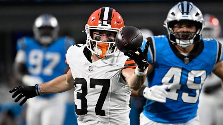  Cleveland Browns wide receiver Luke Floriea (37) with a fingertip catch as Carolina Panthers linebacker Jon Rhattigan (49) defends in the second quarter at Bank of America Stadium.