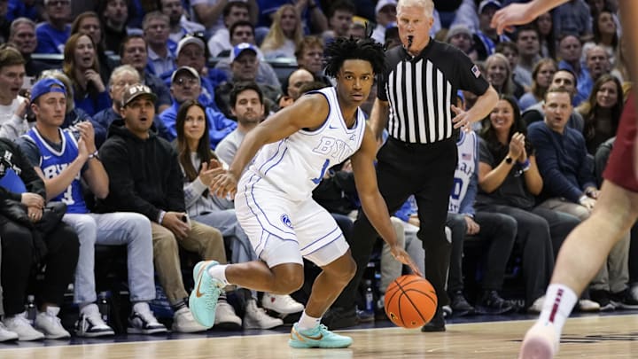 Feb 21, 2026; Provo, Utah, USA; BYU Cougars guard Robert Wright III (1) dribbles the ball during the first half against the Iowa State Cyclones at Marriott Center. Mandatory Credit: Aaron Baker-Imagn Images