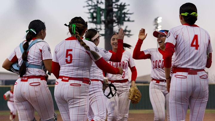 Socorro players celebrate after getting outs during a District 1-6A game against Eastlake at Eastlake High School on Tuesday, March 17, 2026, in El Paso, Texas.