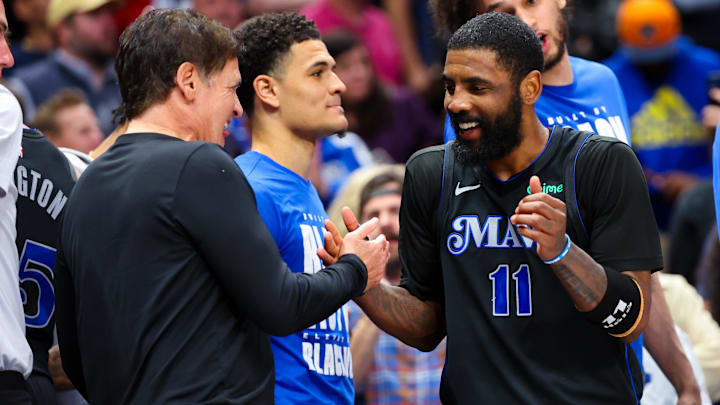 Feb 22, 2024; Dallas, Texas, USA;  Dallas Mavericks guard Kyrie Irving (11) celebrates with Mark Cuban during the second half against the Phoenix Suns at American Airlines Center. Mandatory Credit: Kevin Jairaj-Imagn Images