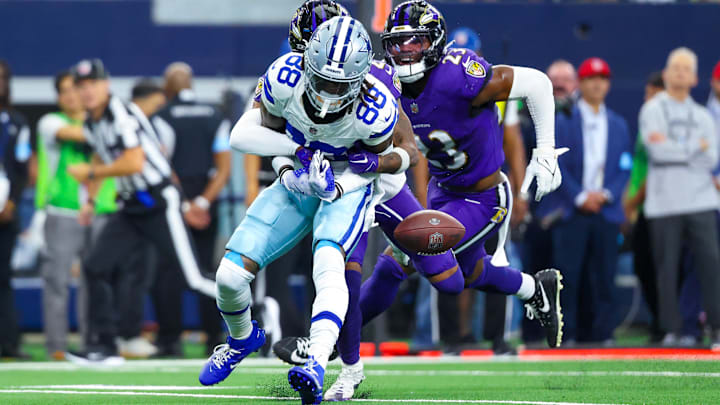 Sep 22, 2024; Arlington, Texas, USA;  Baltimore Ravens cornerback Nate Wiggins (2) knocks the ball out of the hands of Dallas Cowboys wide receiver CeeDee Lamb (88) during the first half at AT&T Stadium. 