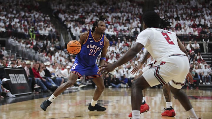Feb 2, 2026; Lubbock, Texas, USA; Kansas Jayhawks guard Darryn Peterson (22) dribbles the ball against Texas Tech Red Raiders guard Jazz Henderson (2) in the second half at United Supermarkets Arena. Mandatory Credit: Michael C. Johnson-Imagn Images Feb 2, 2026; Lubbock, Texas, USA; Kansas Jayhawks guard Darryn Peterson (22) dribbles the ball against Texas Tech Red Raiders guard Jazz Henderson (2) in the second half at United Supermarkets Arena. Mandatory Credit: Michael C. Johnson-Imagn Images