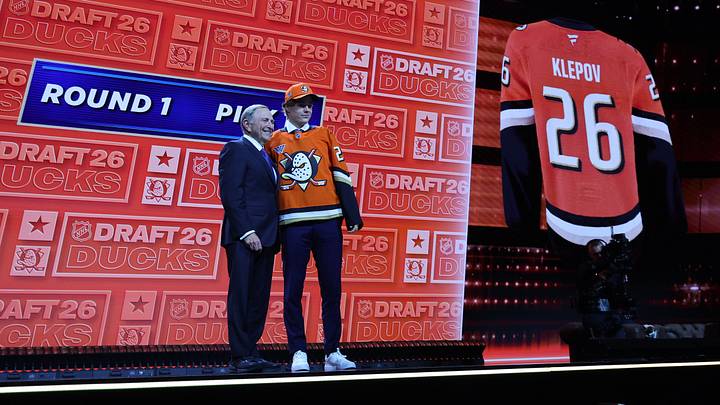 Jun 26, 2026; Buffalo, New York, USA; Nikita Klepov reacts beside NHL commissioner Gary Bettman after being selected with the fifteenth pick in the first round of the 2026 NHL Draft by the Anaheim Ducks at KeyBank Center. Mandatory Credit: Timothy T. Ludwig-Imagn Images