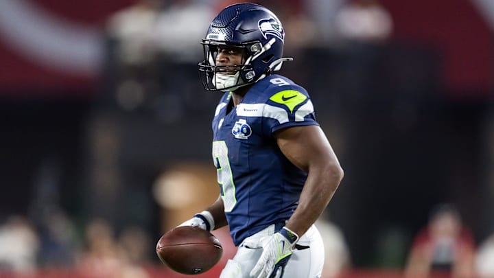 Sep 25, 2025; Glendale, Arizona, USA; Seattle Seahawks running back Kenneth Walker III (9) against the Arizona Cardinals at State Farm Stadium. Mandatory Credit: Mark J. Rebilas-Imagn Images