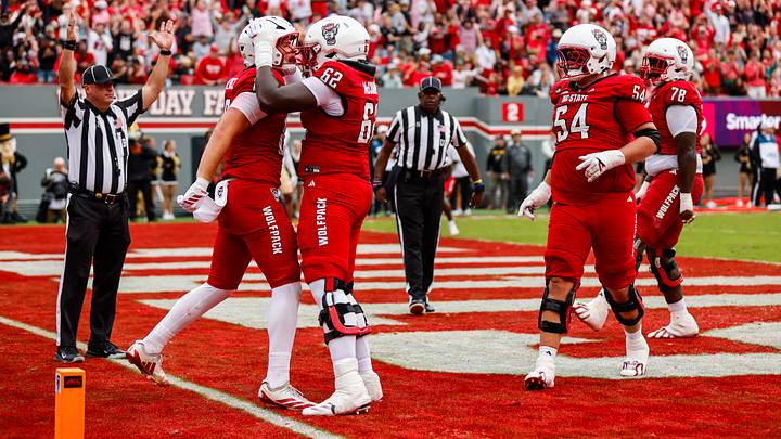 Oct 10, 2026; Raleigh, North Carolina, USA; NC State Wolfpack tight end Hunter Provience (86) celebrates a touchdown with teammates during the first half of the game against Wake Forest Demon Deacons at Carter-Finley Stadium. Mandatory Credit: Jaylynn Nash-Imagn Images Oct 10, 2026; Raleigh, North Carolina, USA; NC State Wolfpack tight end Hunter Provience (86) celebrates a touchdown with teammates during the first half of the game against Wake Forest Demon Deacons at Carter-Finley Stadium. Mandatory Credit: Jaylynn Nash-Imagn Images