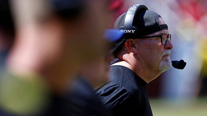 Washington Commanders head coach Dan Quinn looks on from the sidelines during the fourth quarter against the Baltimore Ravens at Northwest Stadium. Mandatory Credit: Peter Casey-Imagn Images