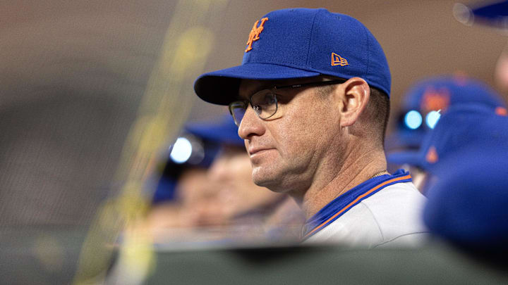 Apr 4, 2026; San Francisco, California, USA; New York Mets manager Carlos Mendoza watches his team take on the San Francisco Giants during the ninth inning at Oracle Park. Mandatory Credit: D. Ross Cameron-Imagn Images