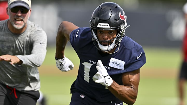 Jun 10, 2025; Houston, TX, USA; Houston Texans wide receiver Jared Wayne (14) participates in a drill during an NFL football minicamp at NRG Stadium. Mandatory Credit: Maria Lysaker-Imagn Images 