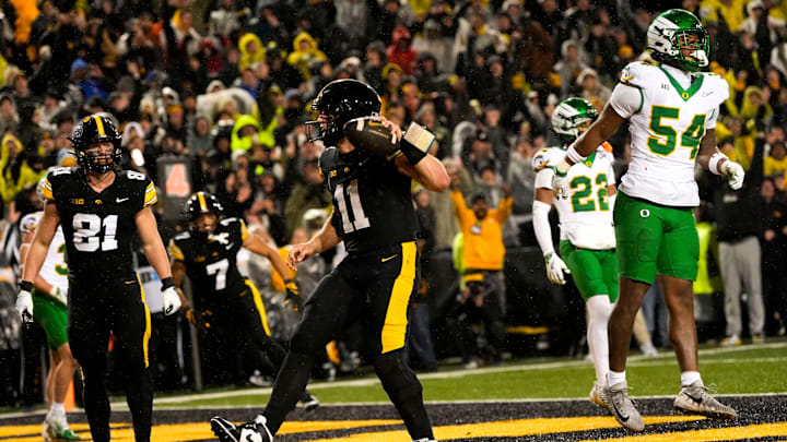 Iowa football QB Mark Gronowski celebrates after scoring a go-ahead touchdown in the fourth quarter against Oregon on Nov. 8, 2025.