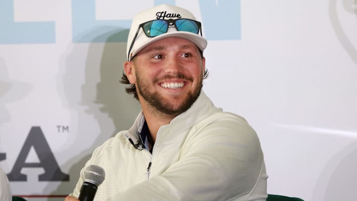 Bills quarterback Josh Allen is greeted as he and other Buffalo players took part in a panel discussion with area students about building connections and the PGA's plans to develop more diversity in the golf workforce.