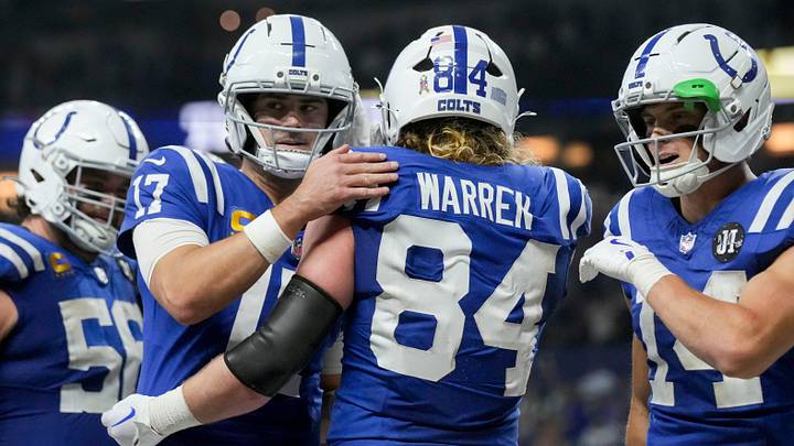 Indianapolis Colts tight end Tyler Warren (84) celebrates with his teammates after scoring a touchdown Sunday, Nov. 30, 2025, during a game against the Houston Texans at Lucas Oil Stadium in Indianapolis.