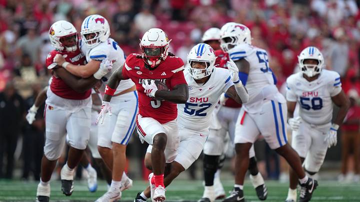 Sep 19, 2026; Louisville, Kentucky, USA; Louisville Cardinals running back Keyjuan Brown (5) carries the ball against the Southern Methodist Mustangs during the fourth quarter at L&N Federal Credit Union Stadium. Mandatory Credit: Chris Carter-Imagn Images Sep 19, 2026; Louisville, Kentucky, USA; Louisville Cardinals running back Keyjuan Brown (5) carries the ball against the Southern Methodist Mustangs during the fourth quarter at L&N Federal Credit Union Stadium. Mandatory Credit: Chris Carter-Imagn Images