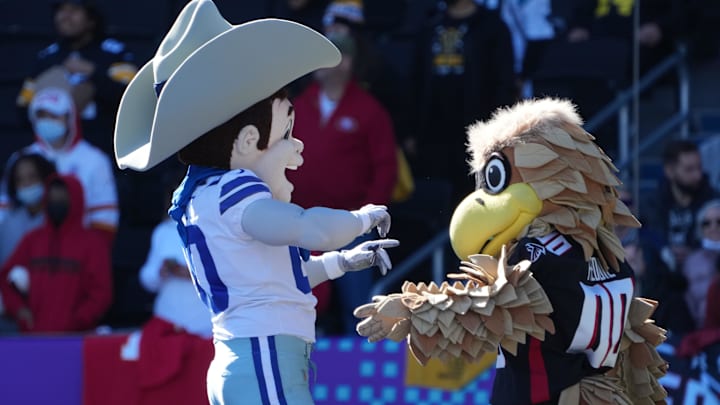Dallas Cowboys mascot Rowdy and Atlanta Falcons mascot Freddie Falcon during NFC practice at the Pro Bowl. Dallas Cowboys mascot Rowdy and Atlanta Falcons mascot Freddie Falcon during NFC practice at the Pro Bowl.