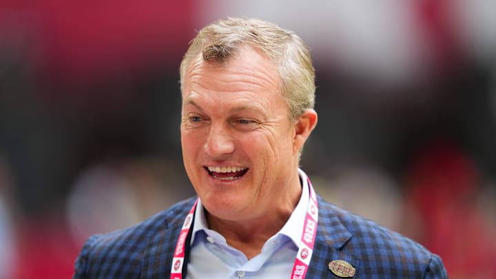Nov 16, 2025; Glendale, Arizona, USA; San Francisco 49ers general manager John Lynch speaks on the sidelines before the game against the Arizona Cardinals at State Farm Stadium. Mandatory Credit: Joe Camporeale-Imagn Images