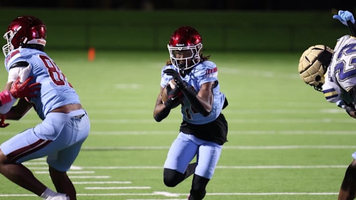 Carver-Columbus running back Zach Watts (14), one of the top freshman running backs in the country, leads the Tigers into the Class AA state title game against Hapeville Charter on Tuesday, Dec. 16, at Mercedes-Benz Stadium in Atlanta.