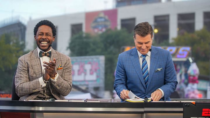 College Gameday hosts Desmond Howard, and Rece Davis during the show's broadcast before the match-off between Texas Longhorns and Oklahoma Sooners in the NCAA college football game at the Cotton Bowl on Saturday, Oct. 7, 2023, in Dallas, Texas. 