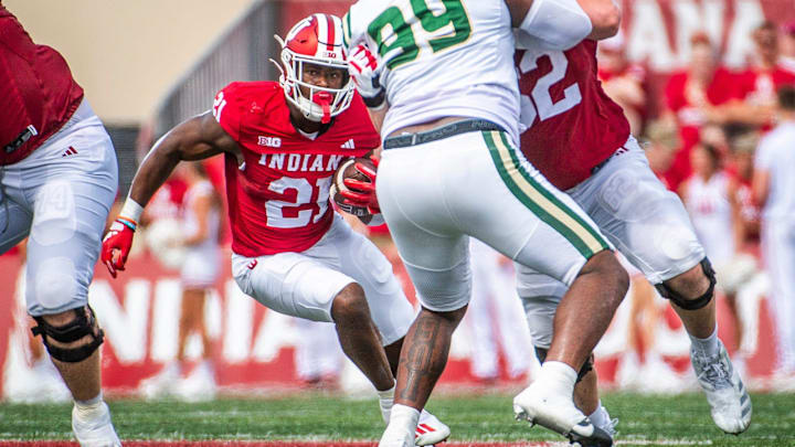 Indiana's Elijah Green (21) runs during the Indiana versus Charlotte football game at Memorial Stadium on Saturday, Sept. 21, 2024.