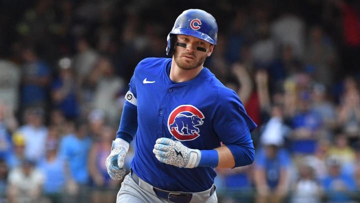 Jun 29, 2024; Milwaukee, Wisconsin, USA; Chicago Cubs outfielder Ian Happ (8) rounds the bases after hitting a home run against the Milwaukee Brewers in the eighth inning at American Family Field.