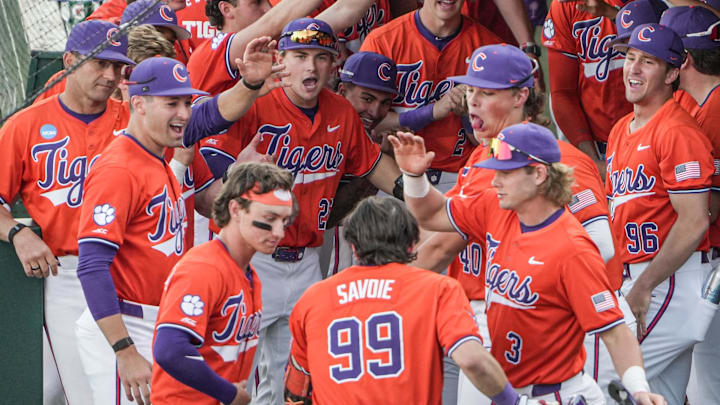 Clemson catcher Nate Savoie (99) is congratulated after hitting a home run during the bottom of the fifth inning at Doug Kingsmore Stadium in Clemson, S.C. Friday, April 10, 2026.