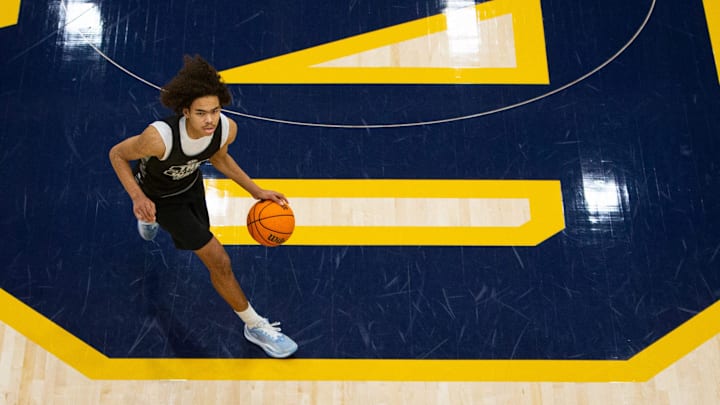 South Bend Washington's Steven Reynolds brings the ball up the court during a scrimmage at the Notre Dame Team Camp at Rolfs Athletics Hall on Thursday, June 13, 2024, in South Bend.