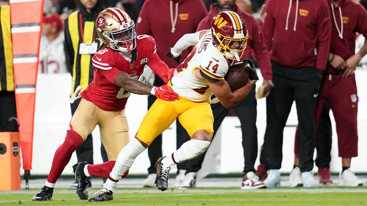 Washington Commanders wide receiver Antonio Williams (14) makes a catch as San Francisco 49ers cornerback Renardo Green (0) defends during the fourth quarter at Levi's Stadium.
