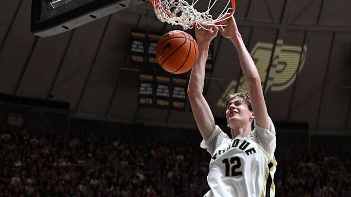 Purdue Boilermakers center Daniel Jacobsen (12) dunks the ball 