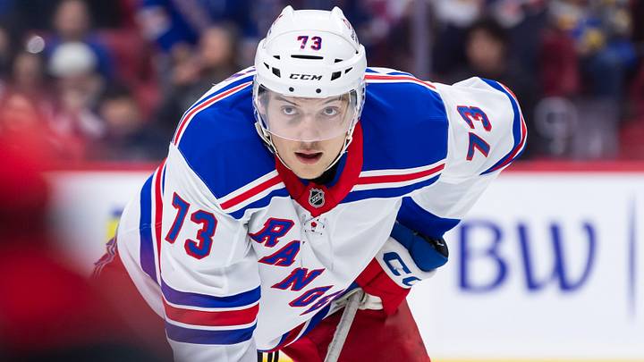 Mar 8, 2025; Ottawa, Ontario, CAN;  New York Rangers center Matt Rempe (73) gets in position for a faceoff in the second period against the  Ottawa Senators at the Canadian Tire Centre. Mandatory Credit: Marc DesRosiers-Imagn Images