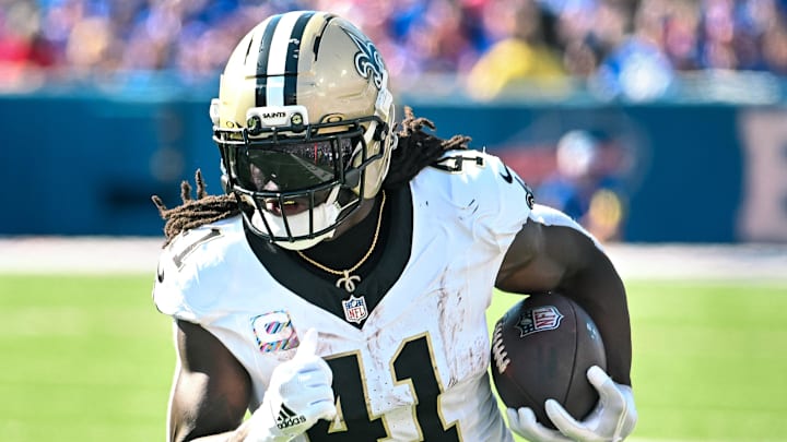 Sep 28, 2025; Orchard Park, New York, USA; New Orleans Saints running back Alvin Kamara (41) carries the ball against the Buffalo Bills in the third quarter at Highmark Stadium. 