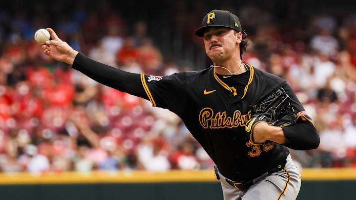 Sep 22, 2024; Cincinnati, Ohio, USA; Pittsburgh Pirates starting pitcher Paul Skenes (30) pitches against the Cincinnati Reds in the third inning at Great American Ball Park. Mandatory Credit: Katie Stratman-Imagn Images