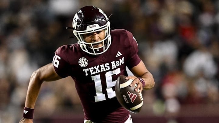 Nov 11, 2023; College Station, Texas, USA; Texas A&M Aggies quarterback Jaylen Henderson (16) runs the ball into the end zone for a touchdown during the second quarter against the Mississippi State Bulldogs at Kyle Field. Mandatory Credit: Maria Lysaker-Imagn Images