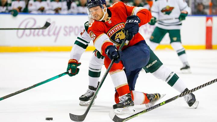 Nov 20, 2021; Sunrise, Florida, USA; Florida Panther center Sam Reinhart (13) moves the puck against the Minnesota Wild during the first period at FLA Live Arena. Mandatory Credit: Sam Navarro-USA TODAY Sports Nov 20, 2021; Sunrise, Florida, USA; Florida Panther center Sam Reinhart (13) moves the puck against the Minnesota Wild during the first period at FLA Live Arena. Mandatory Credit: Sam Navarro-USA TODAY Sports