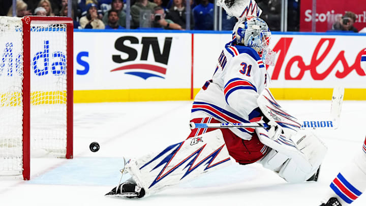 Oct 19, 2024; Toronto, Ontario, CAN; New York Rangers goaltender Igor Shesterkin (31) makes a save against the Toronto Maple Leafs during the third period at Scotiabank Arena. Mandatory Credit: Nick Turchiaro-Imagn Images