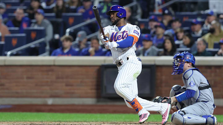 Oct 18, 2024; New York City, New York, USA; New York Mets outfielder Starling Marte (6) hits a double in the sixth inning against the Los Angeles Dodgers during game five of the NLCS for the 2024 MLB playoffs at Citi Field. Mandatory Credit: Brad Penner-Imagn Images Oct 18, 2024; New York City, New York, USA; New York Mets outfielder Starling Marte (6) hits a double in the sixth inning against the Los Angeles Dodgers during game five of the NLCS for the 2024 MLB playoffs at Citi Field. Mandatory Credit: Brad Penner-Imagn Images