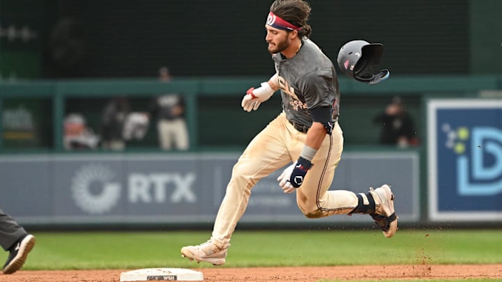 Sep 29, 2024; Washington, District of Columbia, USA; Washington Nationals right fielder Dylan Crews (3) rounds second base after hitting a triple against the Philadelphia Phillies during the sixth inning at Nationals Park.