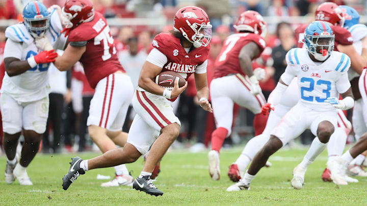 Nov 2, 2024; Fayetteville, Arkansas, USA; Arkansas Razorbacks quarterback Malachi Singleton (3) rushes in the fourth quarter against the Ole Miss Rebels at Donald W. Reynolds Razorback Stadium. Mississippi won 63-31. Mandatory Credit: Nelson Chenault-Imagn Images