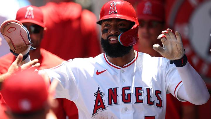 Jun 14, 2026; Anaheim, California, USA; Los Angeles Angels right fielder Jo Adell (7) is greeted in the dugout after scoring a run during the second inning against the Tampa Bay Rays at Angel Stadium. Mandatory Credit: Kiyoshi Mio-Imagn Images Jun 14, 2026; Anaheim, California, USA; Los Angeles Angels right fielder Jo Adell (7) is greeted in the dugout after scoring a run during the second inning against the Tampa Bay Rays at Angel Stadium. Mandatory Credit: Kiyoshi Mio-Imagn Images