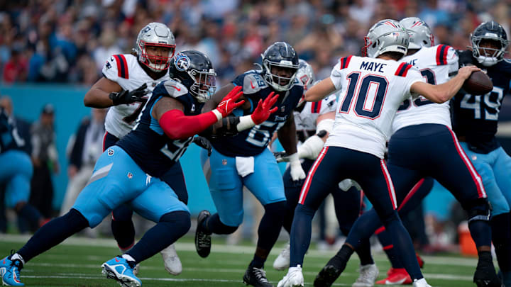 New England Patriots quarterback Drake Maye (10) is pressured by Tennessee Titans defensive tackle Jeffery Simmons (98) and defensive tackle Sebastian Joseph-Day (69) during their game at Nissan Stadium in Nashville, Tenn., Sunday, Nov. 3, 2024.