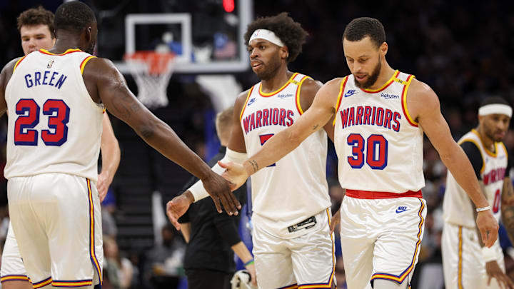 Feb 27, 2025; Orlando, Florida, USA; Golden State Warriors guard Stephen Curry (30) and forward Draymond Green (23) celebrate after a play against the Orlando Magic in the third quarter at Kia Center. Mandatory Credit: Nathan Ray Seebeck-Imagn Images