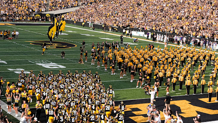The Iowa Hawkeyes team takes the field against the Albany Great Danes during the Swarm Aug. 30, 2025 at Kinnick Stadium in Iowa City, Iowa.