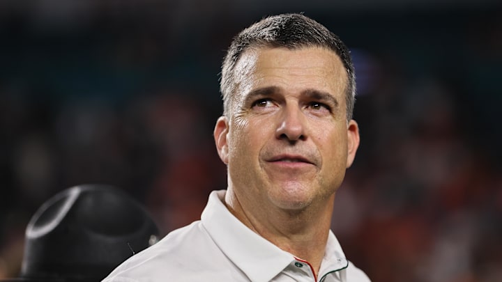 Oct 26, 2024; Miami Gardens, Florida, USA; Miami Hurricanes head coach Mario Cristobal looks on after the game against the Florida State Seminoles at Hard Rock Stadium. Mandatory Credit: Sam Navarro-Imagn Images Oct 26, 2024; Miami Gardens, Florida, USA; Miami Hurricanes head coach Mario Cristobal looks on after the game against the Florida State Seminoles at Hard Rock Stadium. Mandatory Credit: Sam Navarro-Imagn Images